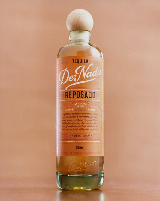 De Nada Reposado on a terracotta wall